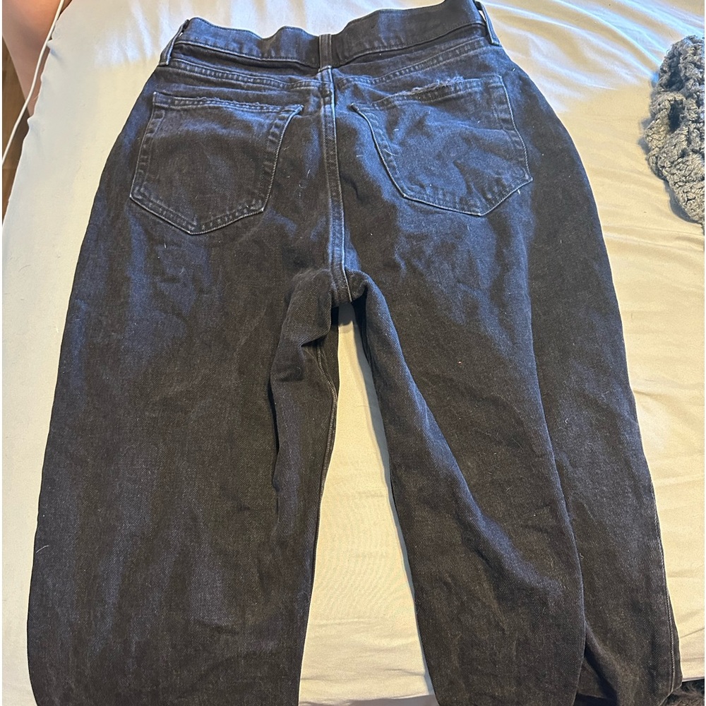 Black cross over jeans. Still with tags, never worn.
